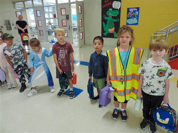 line of students in costumes